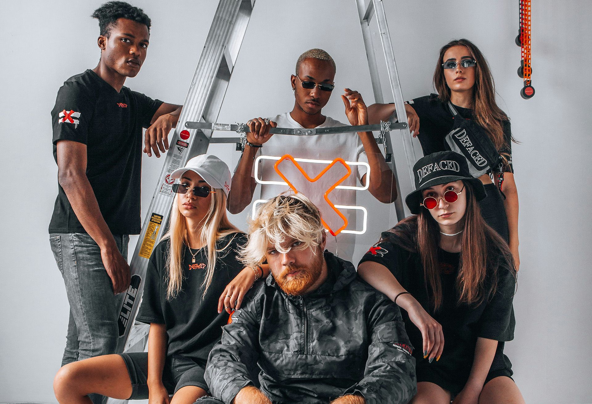  employees laughing together on a couch